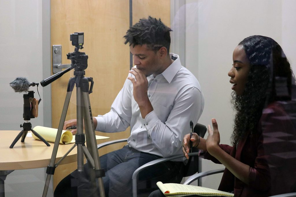 Marketing interns Kyle Chambers and Denielle Smith interview an inventor behind the scenes of Standing InnOvation.